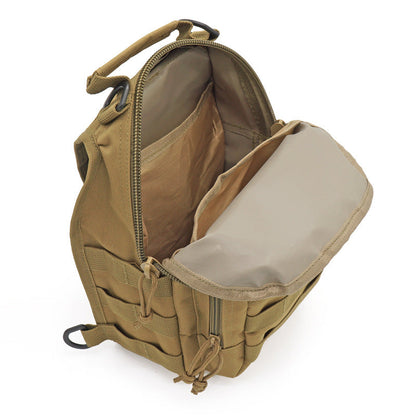 Close-up of the durable construction and MOLLE system on a black tactical military grade sling bag.