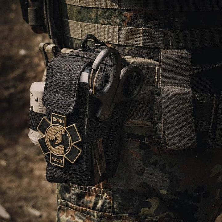 Tactical outdoor gear set with black nylon waist bag, survival kit for adventure