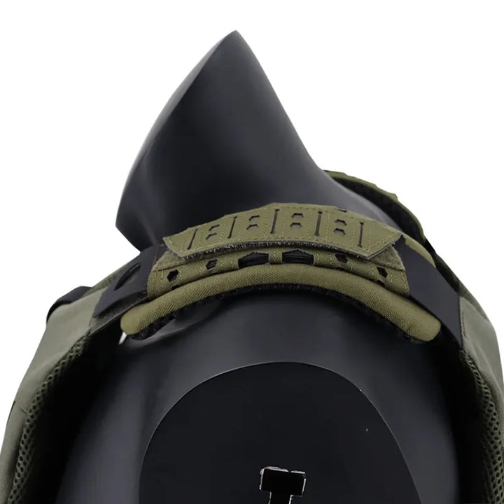 Tactical shoulder pads attached to a backpack, demonstrating improved weight distribution for gear.