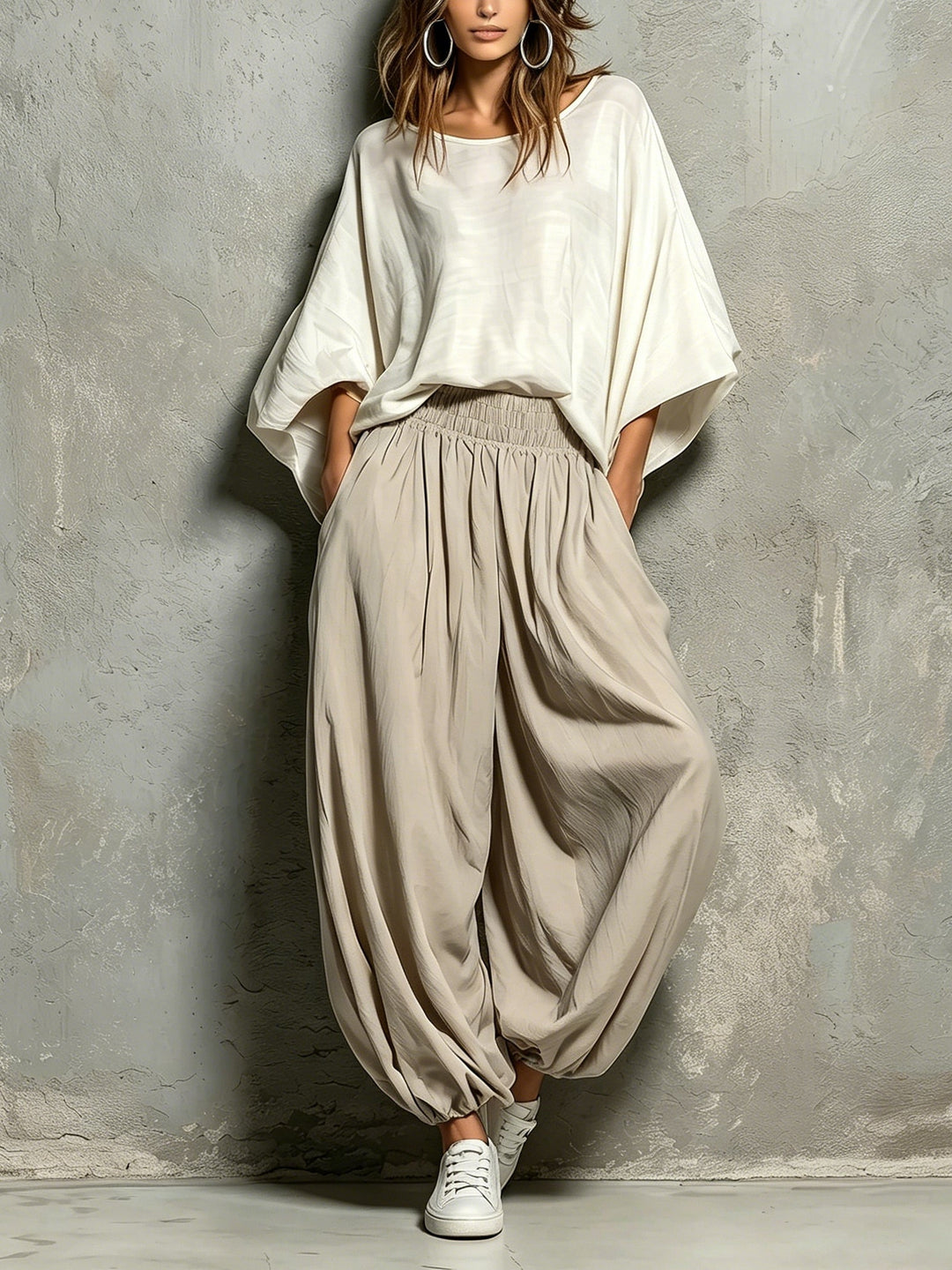 Taupe wide leg harem pants for women, featuring a high waist and drawstring, perfect for casual or travel wear.