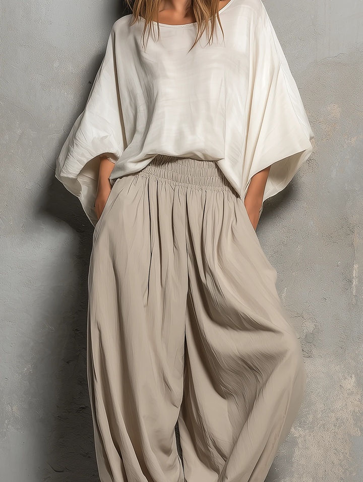 Casual women's taupe wide leg harem pants with drawstring, ideal for spring and summer fashion.