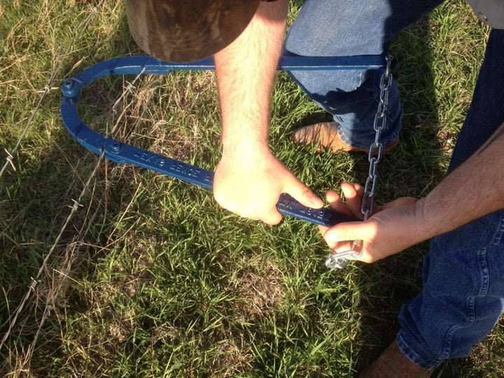 Texas Fence Fixer tool for quickly securing loose farm fences, a robust metal wire tensioner for agricultural use.