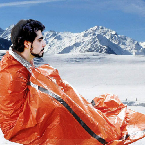Reflective interior of a thermal bivy survival sleeping bag designed to retain body heat.