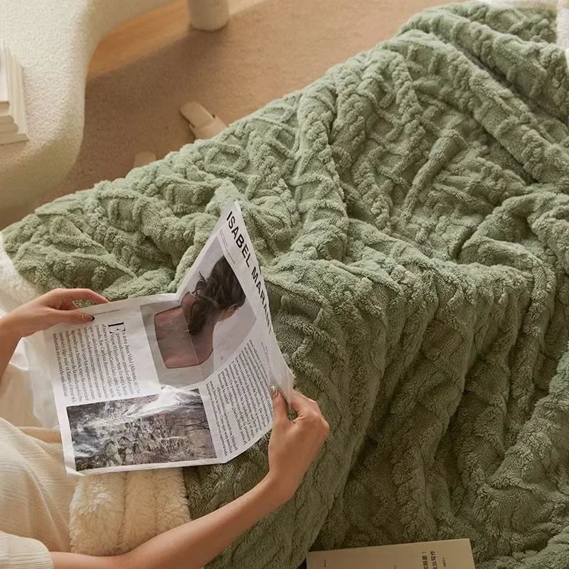 Soft unisex lambswool fleece throw, perfect for bedding or home decor in winter.
