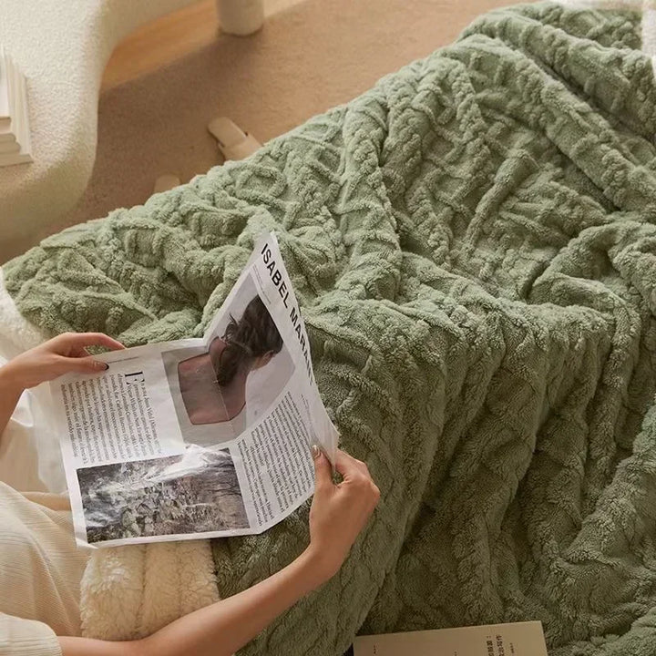 Soft unisex lambswool fleece throw, perfect for bedding or home decor in winter.