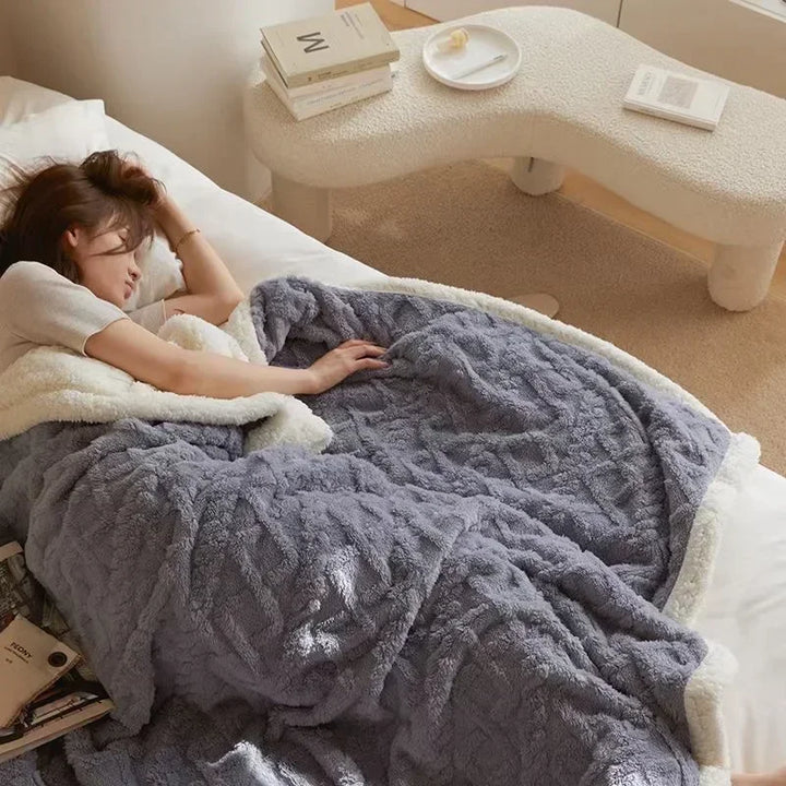 Luxurious thick lambswool blanket, perfect for adding warmth & style to any room.