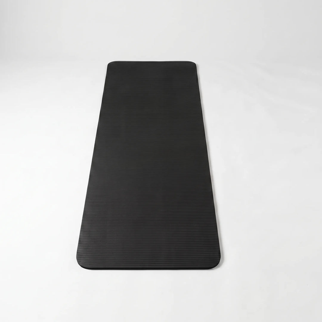 Comfortable thick yoga mat provides joint support for Pilates & home workouts. Durable NBR foam exercise equipment.