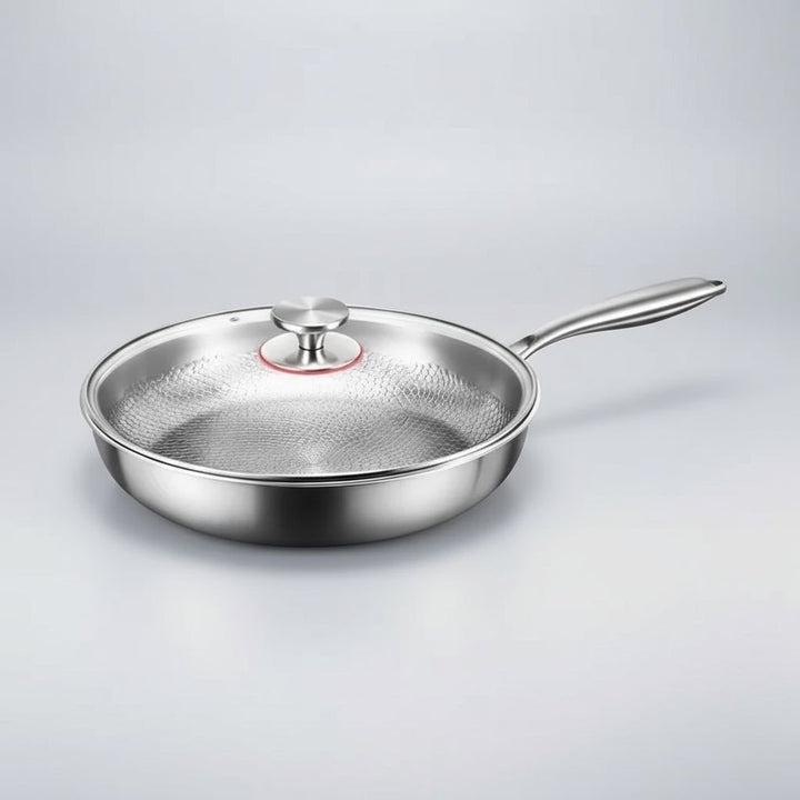 Superior titanium hammered non-stick skillet, induction ready, offers even heating and effortless food release.