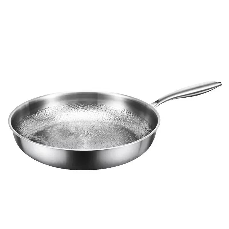 Modern titanium hammered non-stick induction skillet, providing efficient and healthy cooking with quick cleanup.