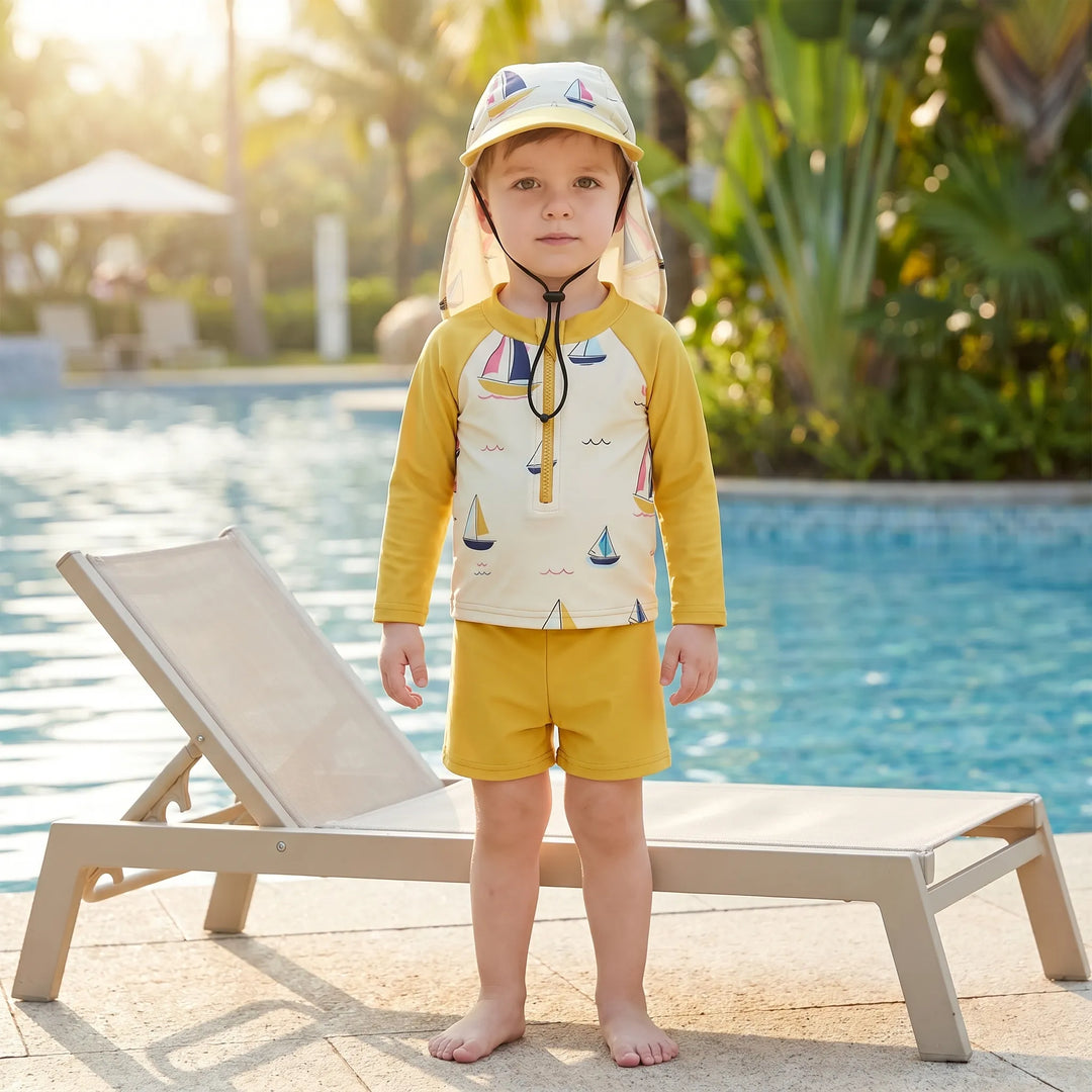 Toddler 3-piece swim set: long-sleeve rash guard, shorts, & sun protection hat for boys or girls. Perfect beach/pool outfit.