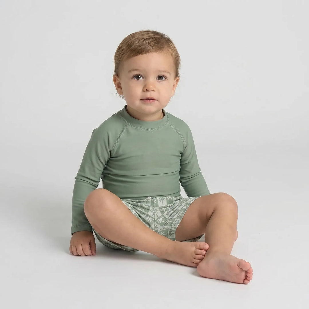 Children's long sleeve rash guard swim set, ensuring sun protection for toddlers during water play.
