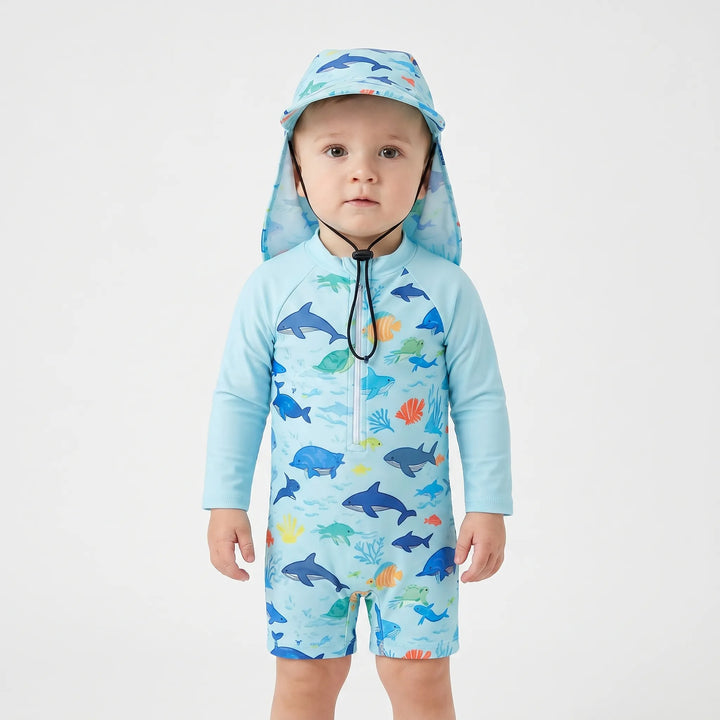 Cute marine print toddler swim romper set with long sleeves. Easy wear sun protective baby beach outfit.
