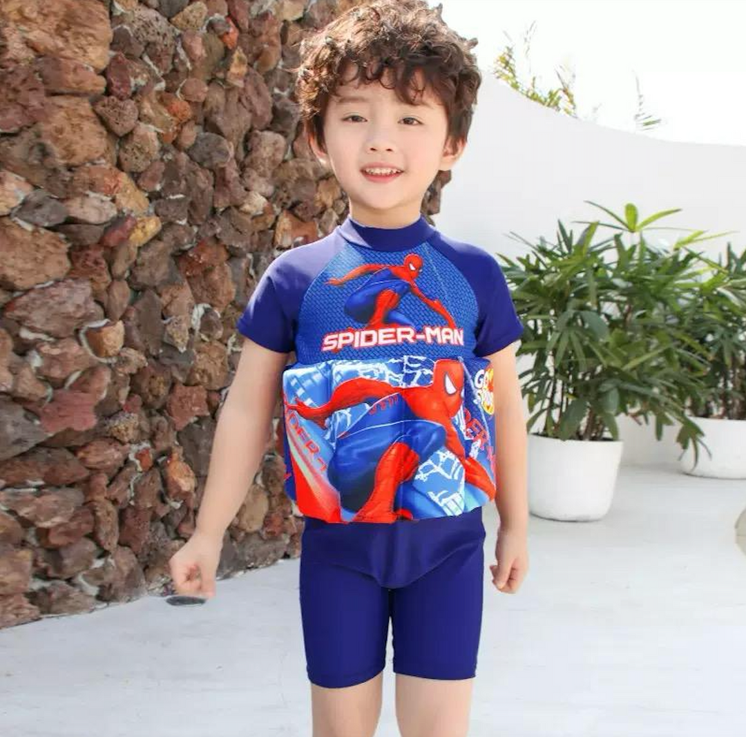 Colorful toddler swim vest with shorts, UV protection for beach day.