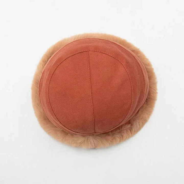 Textured knit women's winter hat. Trendy FrostChic beanie with warm fleece lining, perfect for cold weather style.