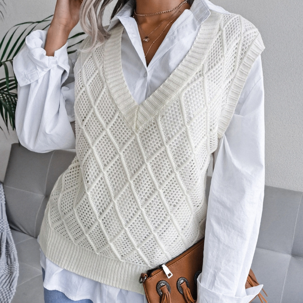 Soft knitted women's sweater, a trendy & comfortable layering piece for chic autumn and winter outfits.