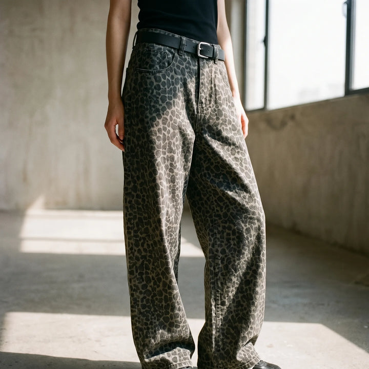 Trendy women's leopard print high-waisted wide-leg jeans, perfect for a casual streetwear look.