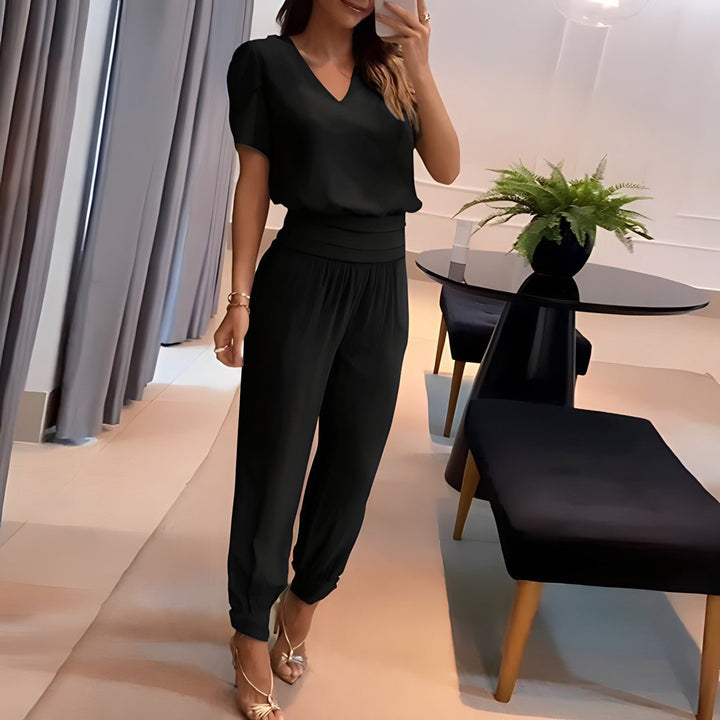Complete women's two-piece outfit, a modern matching set with a stylish top and comfortable bottom for trendy fashion.