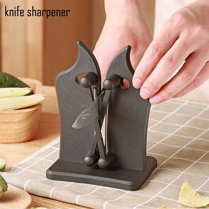 Metal black triple-action knife sharpener for quick, efficient blade sharpening in any kitchen.
