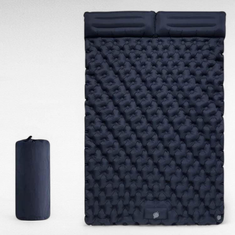 Foot actively pumping the integrated air mattress mechanism, illustrating fast and effortess inflation.