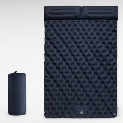 Foot actively pumping the integrated air mattress mechanism, illustrating fast and effortess inflation.