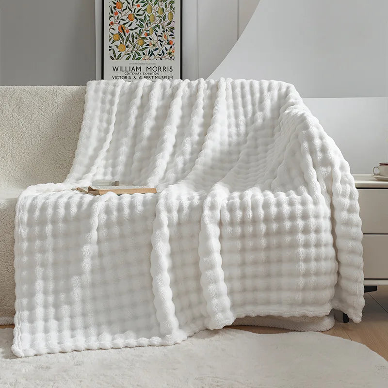 Cozy, warm luxury fleece throw blanket, perfect for bedroom or living room home decor.
