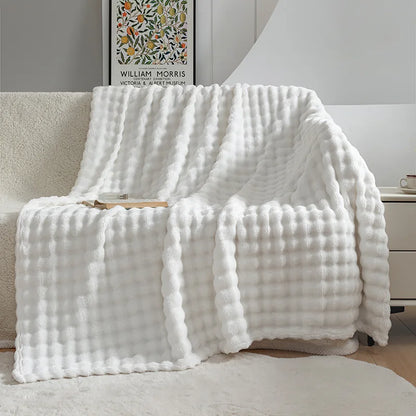 Cozy, warm luxury fleece throw blanket, perfect for bedroom or living room home decor.