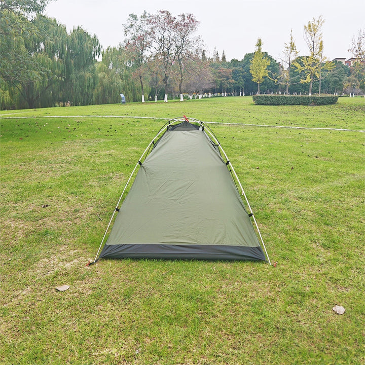 Close-up of ultralight 2-person dome tent fabric in army green, highlighting waterproof and durable materials.