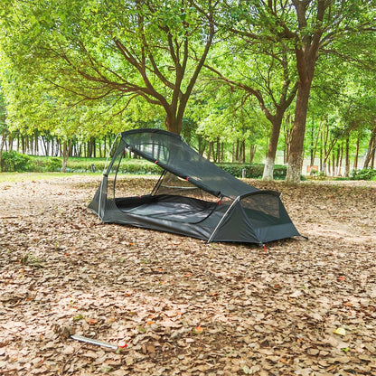 Setup view of ultralight 2-person waterproof tunnel camping tent in nature