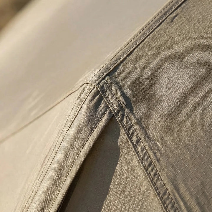 Compact, packed ultralight hiking tent, demonstrating its lightweight and portable design for easy travel.
