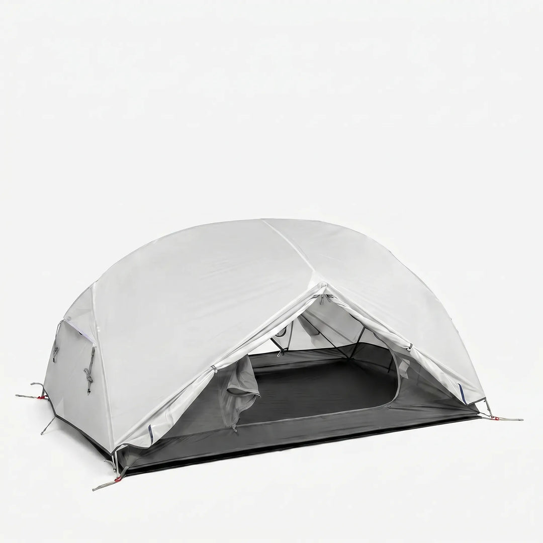 Detail of the strong yet lightweight poles of an ultralight travel tent, highlighting easy setup for hikers.
