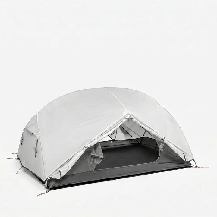Detail of the strong yet lightweight poles of an ultralight travel tent, highlighting easy setup for hikers.