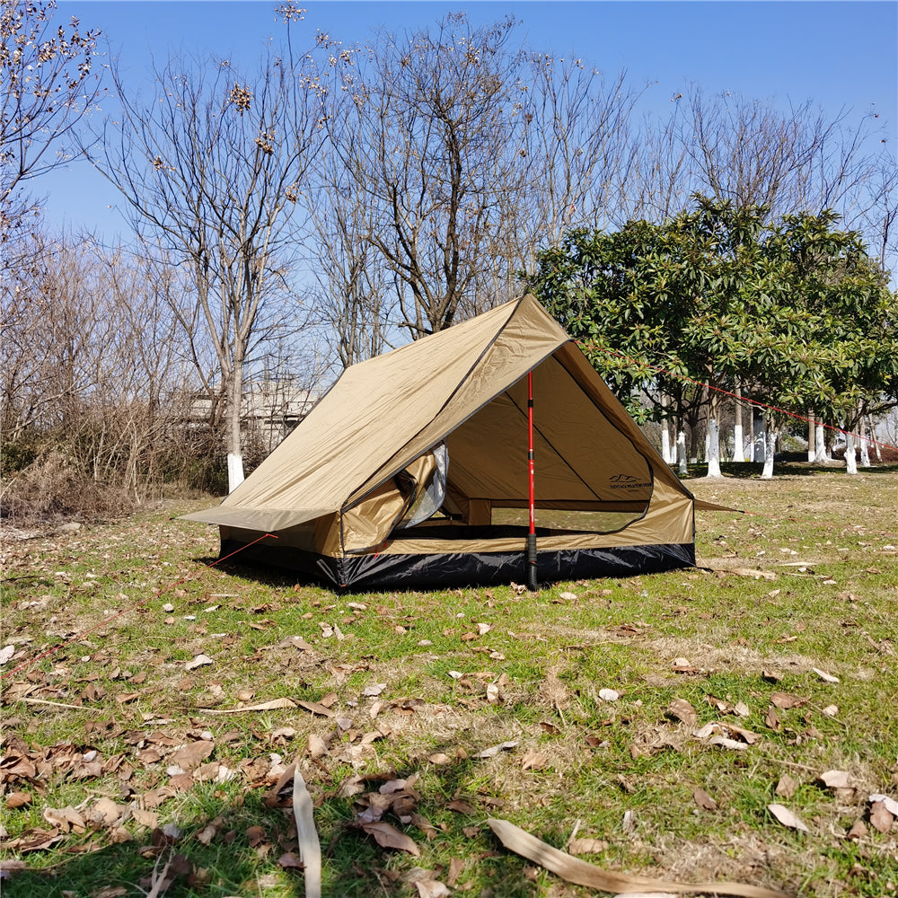 Ultralight backpacking tent, packed size comparison to a water bottle.
