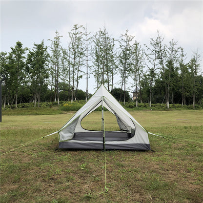 A-frame backpacking tent with rainfly deployed, ready for a storm.