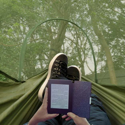 Portable travel hammock featuring a built-in bug net, ideal for comfortable and protected camping trips