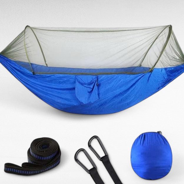 Lightweight camping hammock with an integrated bug net, designed for easy transport on hiking trails
