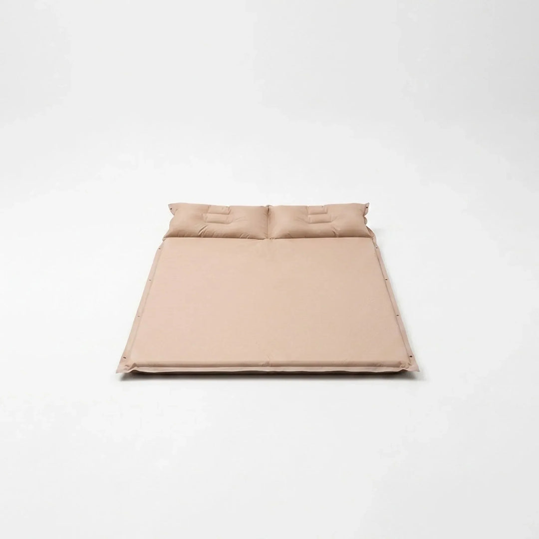 Portable self-inflating camping mat providing ultralight comfort for outdoor adventures & backpacking trips.