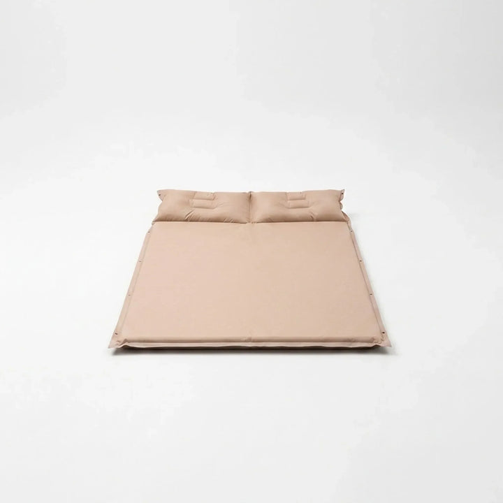 Portable self-inflating camping mat providing ultralight comfort for outdoor adventures & backpacking trips.