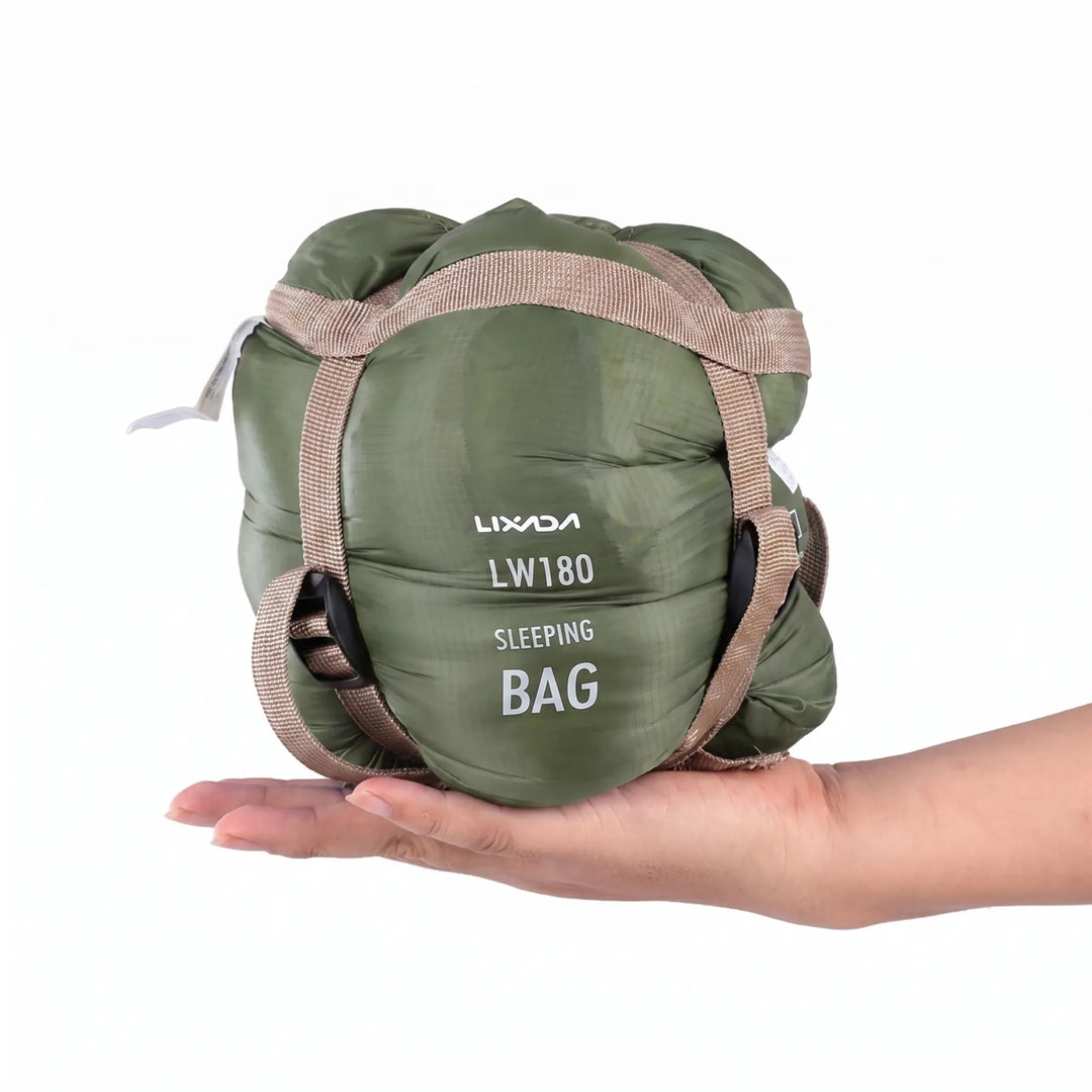Adult ultralight envelope sleeping bag, compact outdoor gear for camping, hiking, and travel.