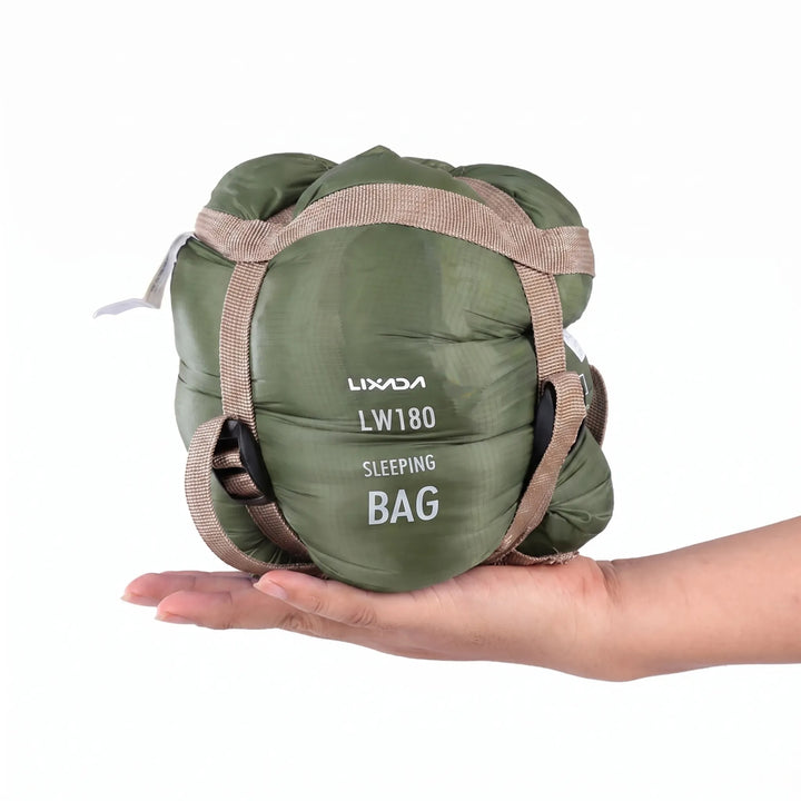 Adult ultralight envelope sleeping bag, compact outdoor gear for camping, hiking, and travel.
