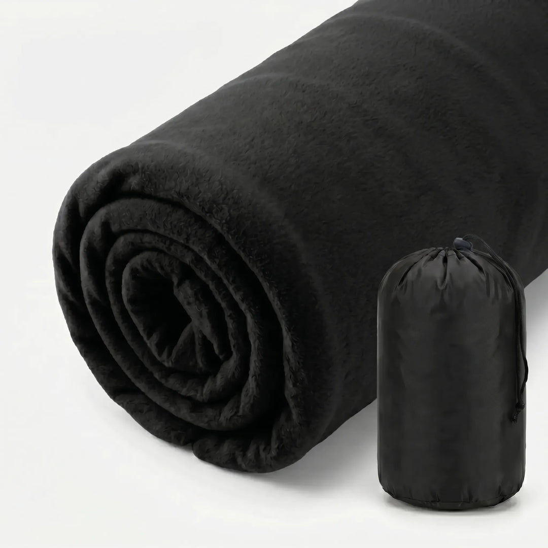 Compact fleece sleeping bag liner, ultralight for easy packing on camping & travel trips.