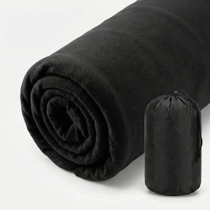 Compact fleece sleeping bag liner, ultralight for easy packing on camping & travel trips.