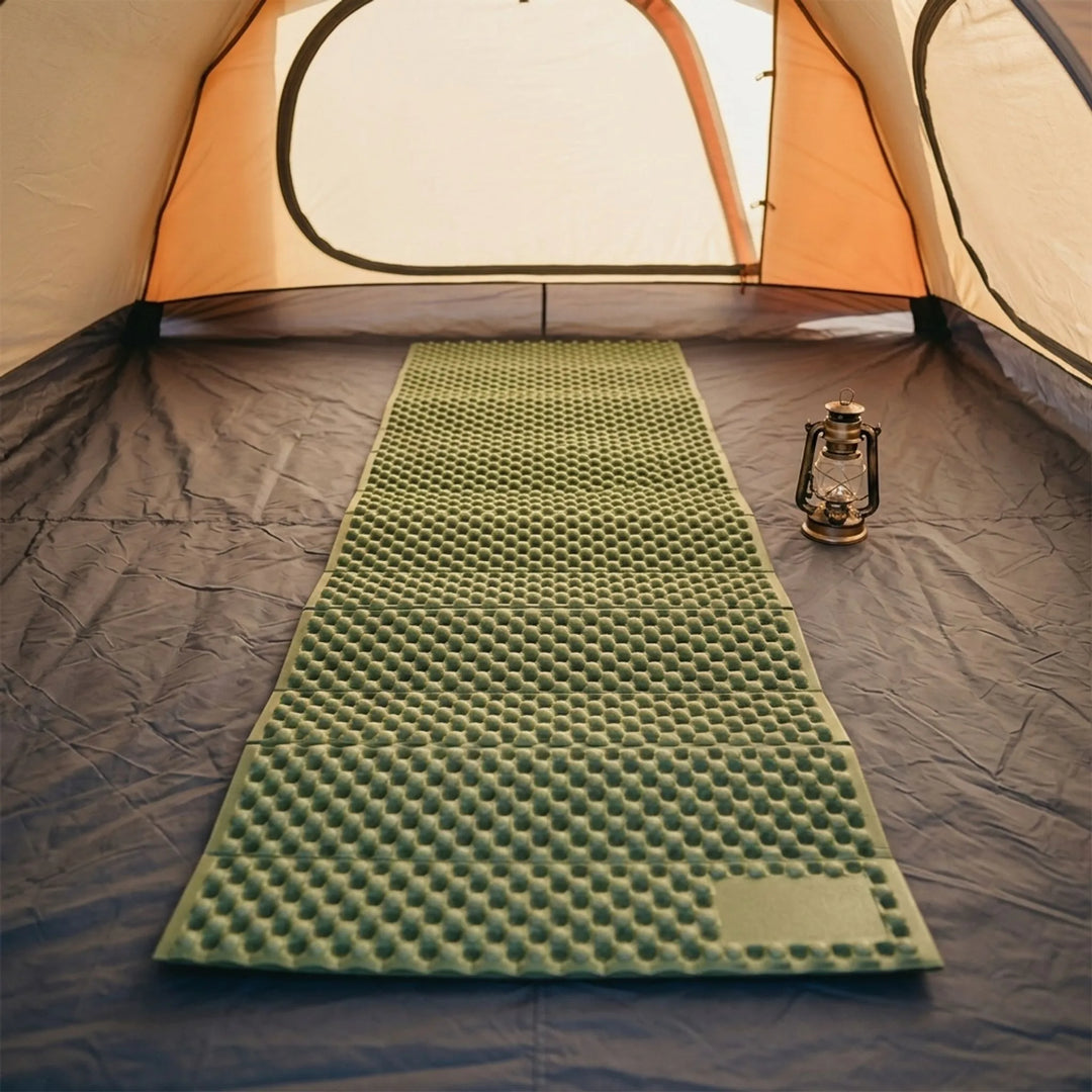 Ultralight gray camping mat for backpacking. Insulated sleeping pad, perfect for outdoor hiking & travel gear.
