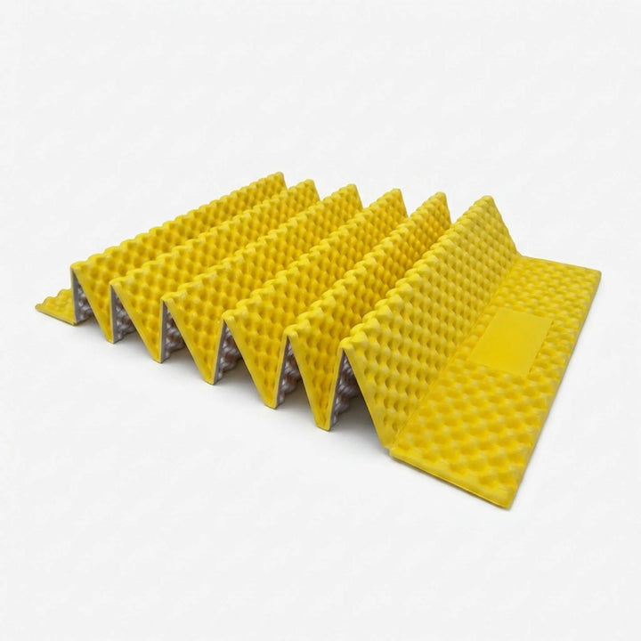 Close-up of a gray ultralight sleeping pad. Insulated camping mat providing comfort for outdoor adventures.