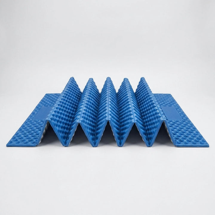 Unisex ultralight gray camping mat in a tent. Comfortable insulated sleeping pad for backpacking & travel.