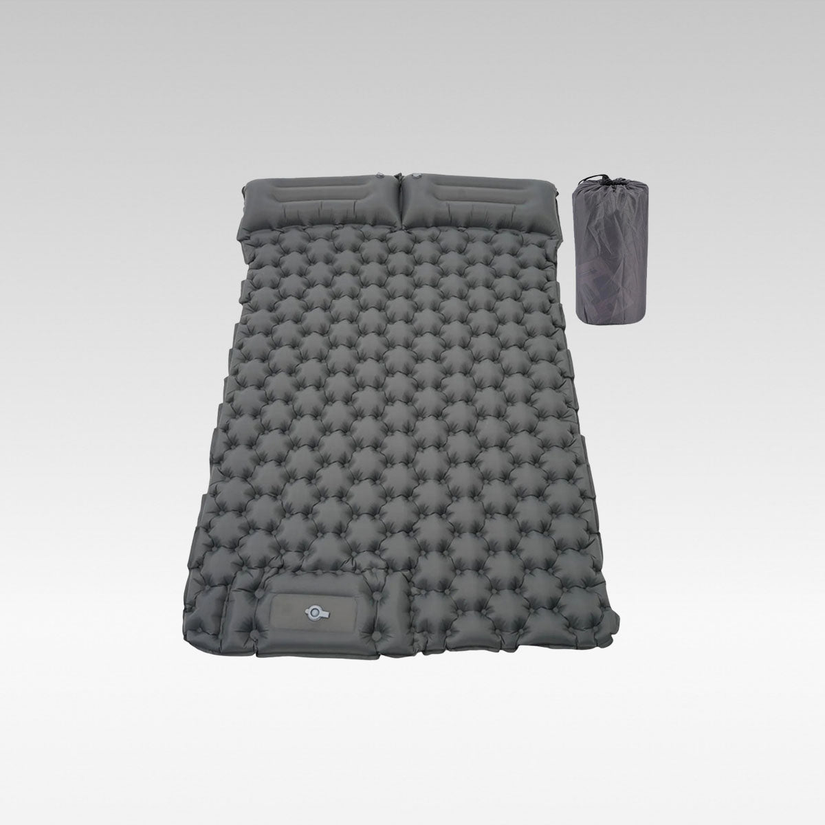 Ultralight inflatable camping mattress with built-in foot pump, shown deflated for portability.