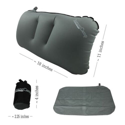 Compact inflatable camping pillow, orange, shown in use on a sleeping bag