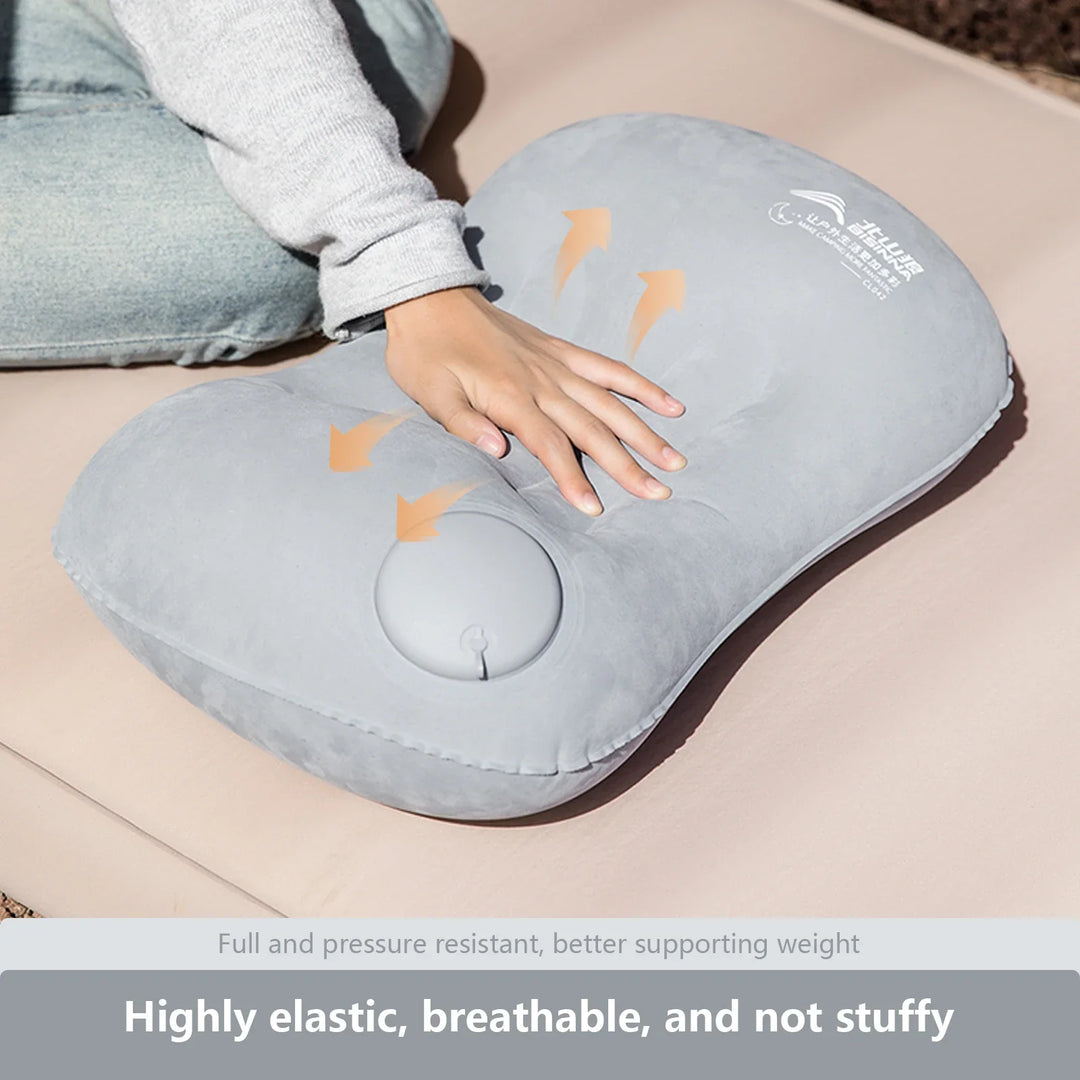 Durable ultralight inflatable travel pillow with quick-inflate pump, perfect for campers and hikers.