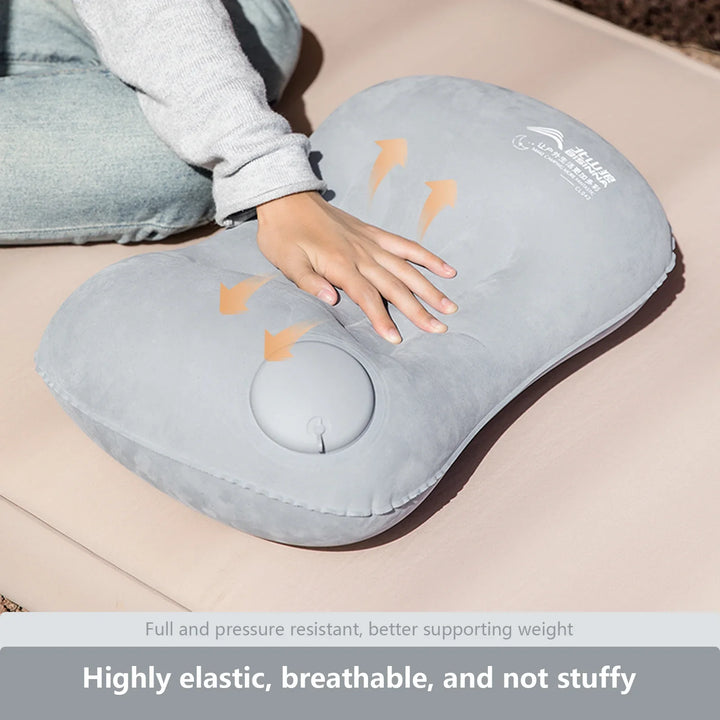 Durable ultralight inflatable travel pillow with quick-inflate pump, perfect for campers and hikers.