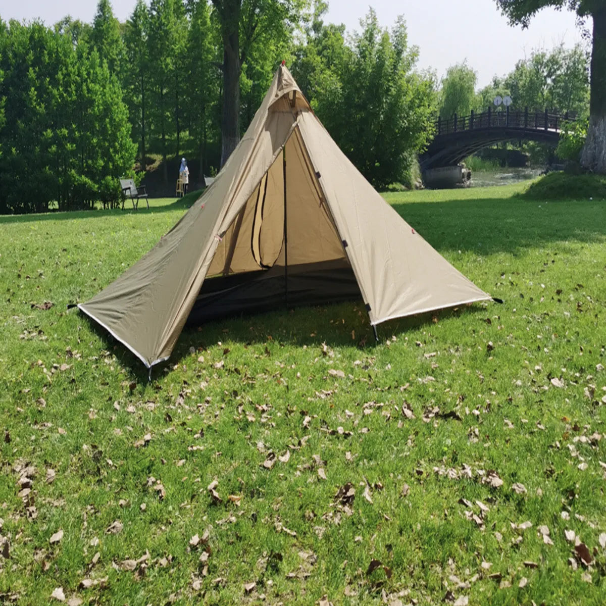 Compact 3-season trekking pole tent, perfect for solo or duo camping adventures.