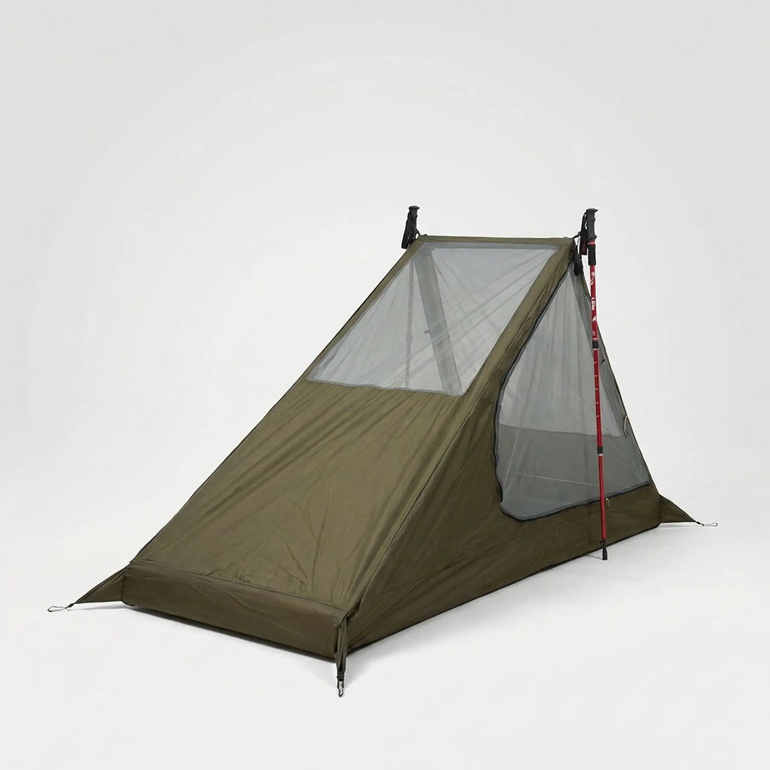 Compact trekking pole mesh tent for one person, ideal ultralight shelter for camping and outdoor adventures.